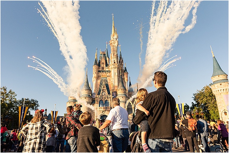 Fireworks surround the Magic Kingdom castle for Disney World tips and tricks by travel photographer Stefanie Harrington
