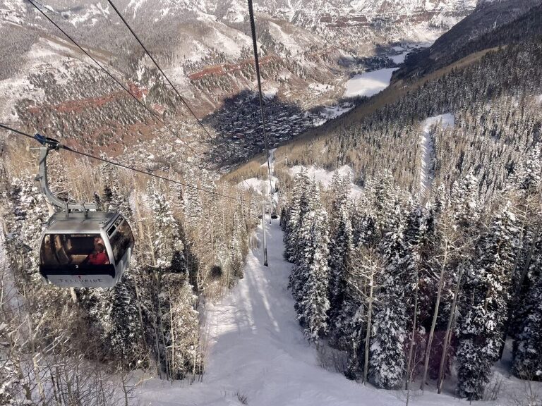 Riding the gondola to the town of Telluride with kids